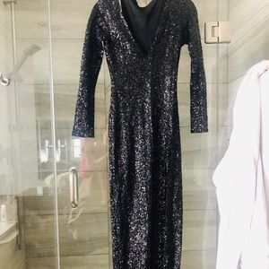 Floor length black sequin gown w thigh high slit